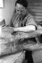 Henry Moore working on <i>Family</i> in the Top Studio, Perry Green, c.1943.<br><br>