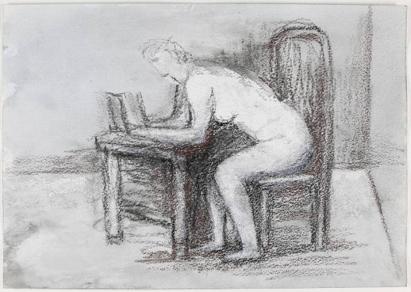 Girl Reading at Desk